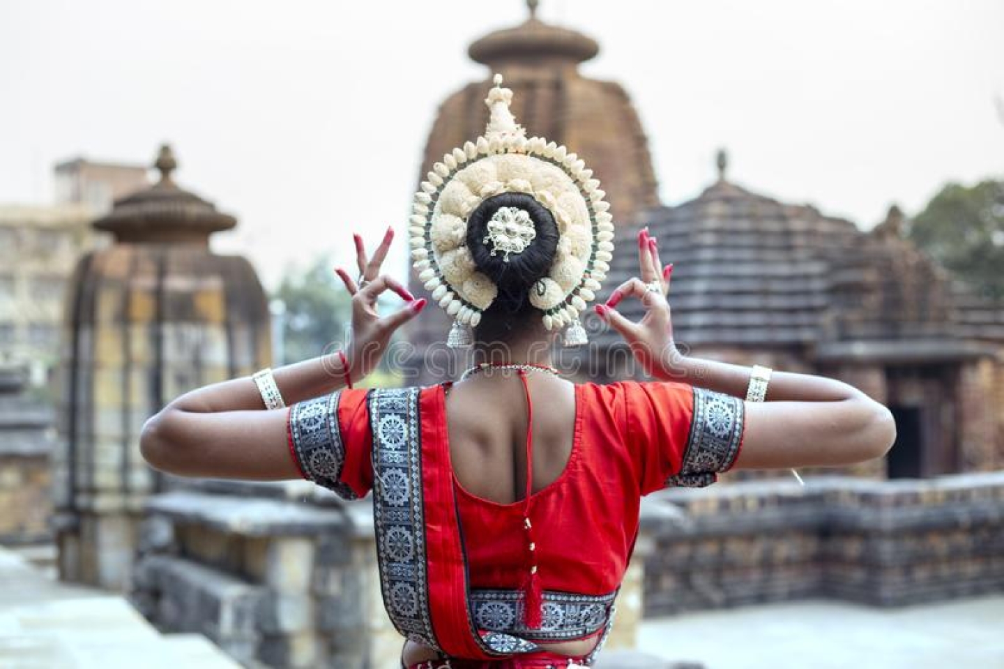 young-odissi-female-artist-shows-her-inner-beauty-mukteshvara-temple-bhubaneswar-odisha-india-young-odissi-female-artist-shows-154129956